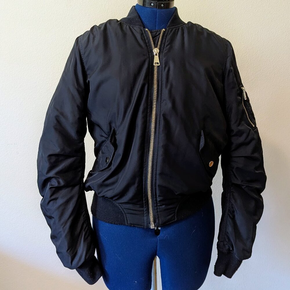 Navy Bomber jacket with leopard faux fur lining